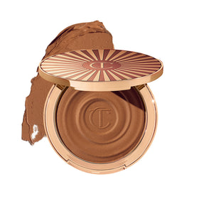 Charlotte Tilbury front jar image showing packaging and shade Medium benefit natural glow