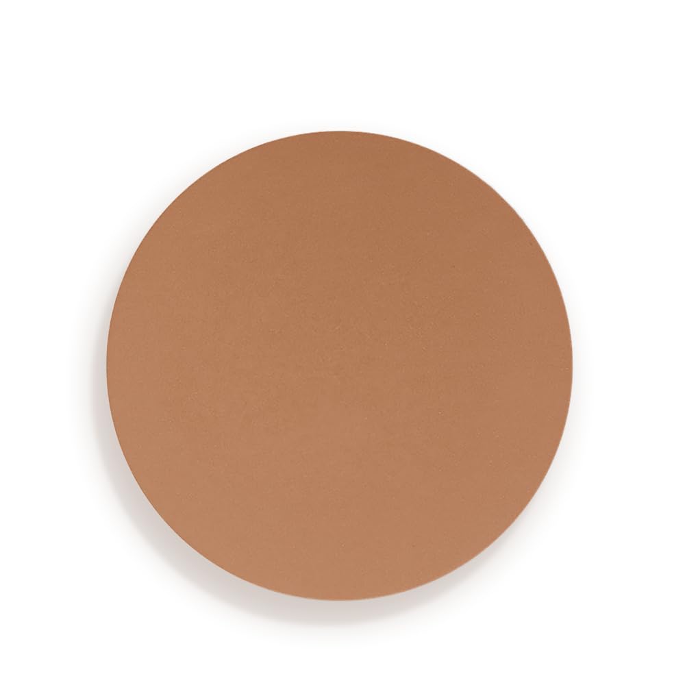 Charlotte Tilbury bronzer held in hand for size comparison and portable convenience