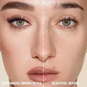 Charlotte Tilbury applying pencil in mirror for quick shaping and polished brows