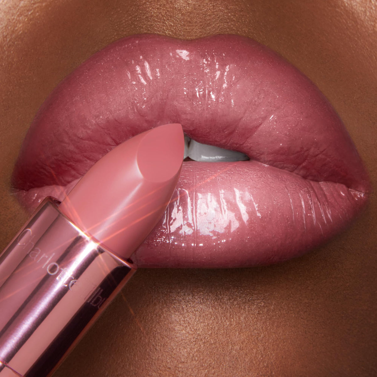 Charlotte Tilbury lipstick packaging close-up showing embossed brand details and premium presentation