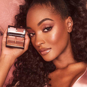 Charlotte Tilbury blush applied on cheek demonstrating Pillow Talk Deep sculpting and radiant glow