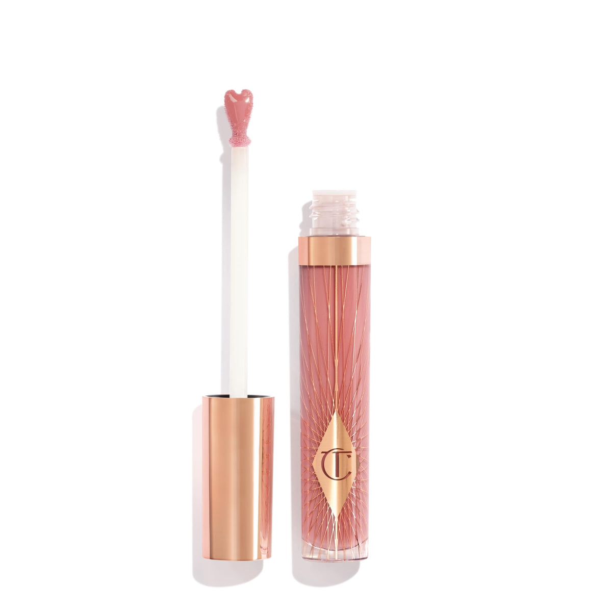 Charlotte Tilbury front tube showing Pillow Talk Fair and generous size benefit