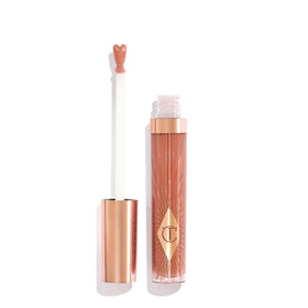 Charlotte Tilbury front tube showing Pillow Talk gloss and instant shine benefit