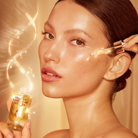 Charlotte Tilbury texture close-up of oil sheen, conveys fast-absorbing glow benefit