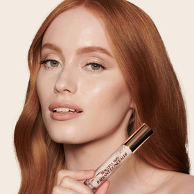 Charlotte Tilbury dropper dispensing concealer highlighting creamy finish