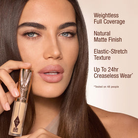 Charlotte Tilbury shade 7 medium tube next to coin for size and scale