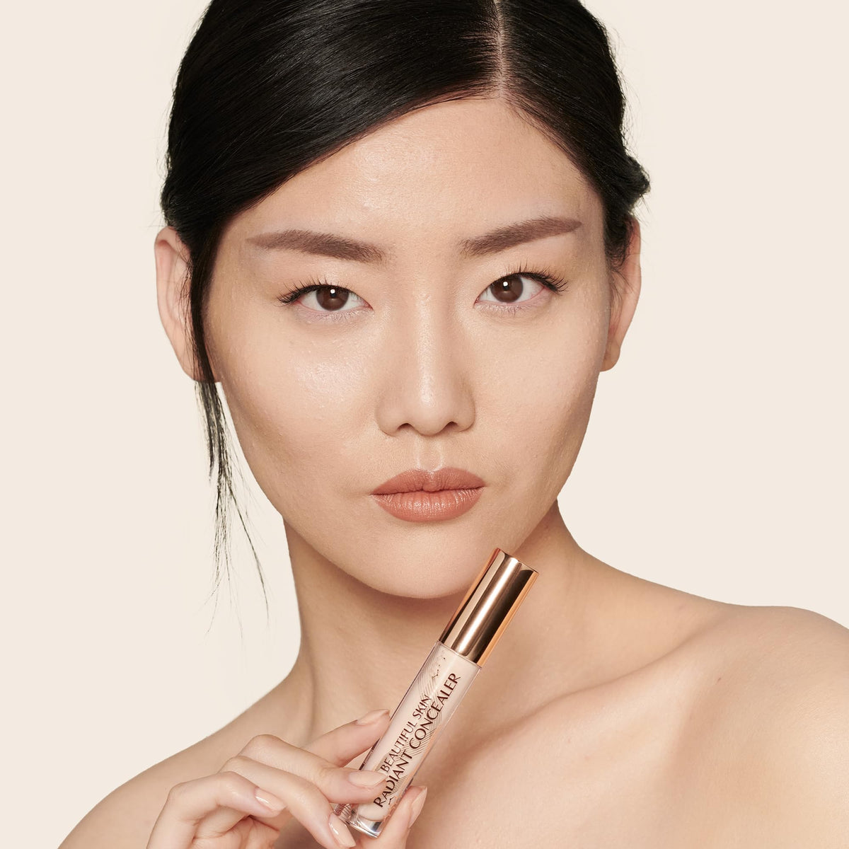 Charlotte Tilbury concealer texture closeup showing radiant, hydrating finish