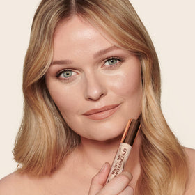 Charlotte Tilbury under-eye application demonstrating brightening and lifting effect