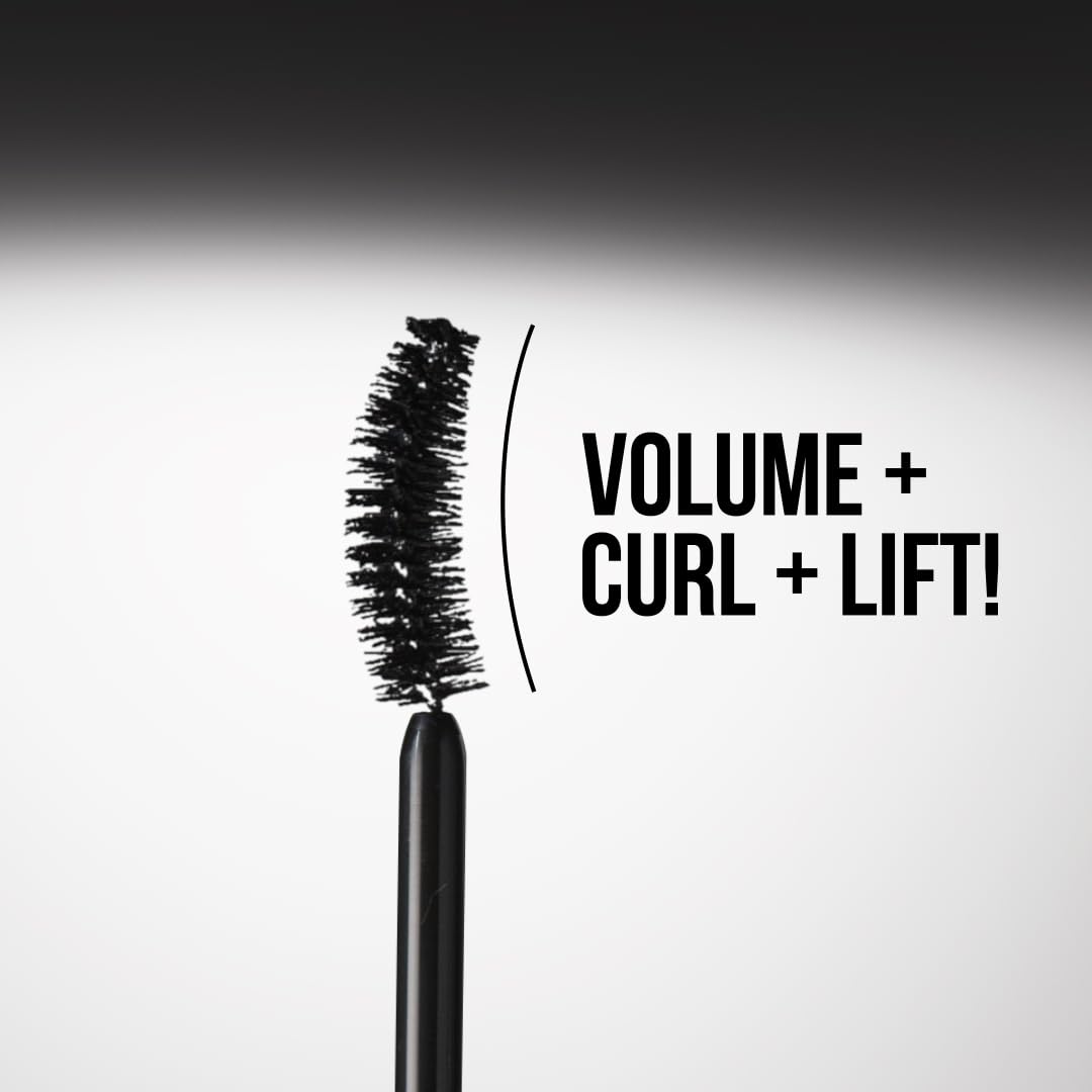 Charlotte Tilbury mascara on vanity with makeup items portraying everyday glamour use