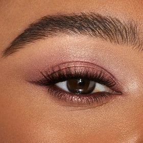 Charlotte Tilbury Pillow Talk applied on eyelids demonstrating luminous finish