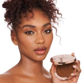 Charlotte Tilbury before and after face shot, highlights natural-looking bronzed finish