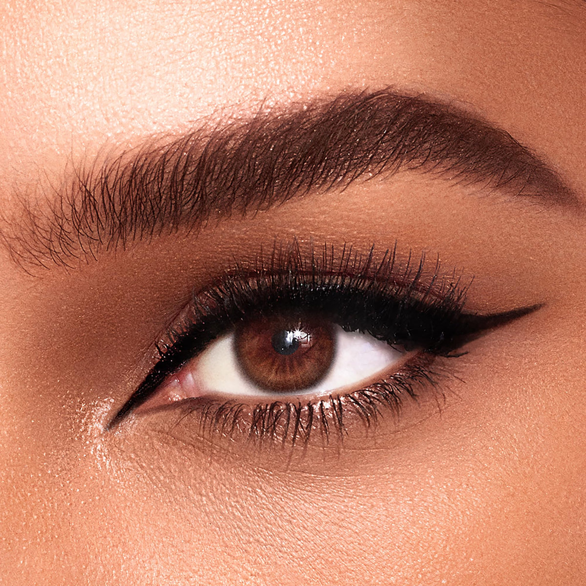 Charlotte Tilbury swatches showing Panther black intense matte payoff