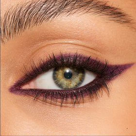 Charlotte Tilbury swatch of Fig Smoulder on skin showing rich pigment