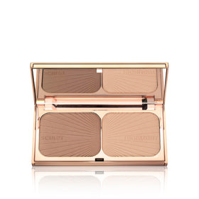 Charlotte Tilbury palette held in hand to show compact size and travel-friendly benefit