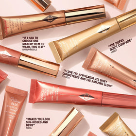 Charlotte Tilbury flatlay with Pillow Talk pieces showing coordinated color story and styling