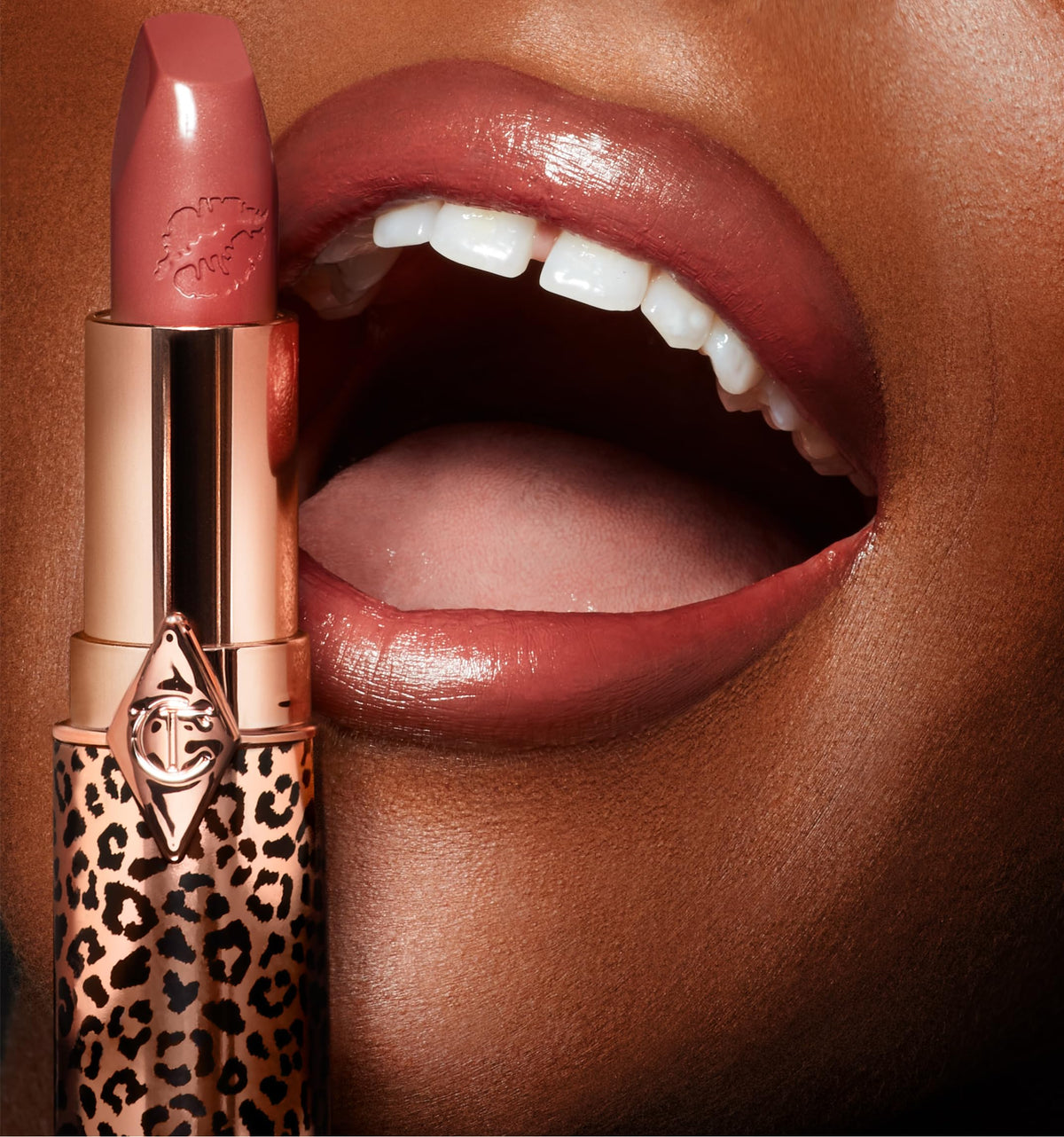 Charlotte Tilbury Glowing Jen lifestyle shot enhancing complexion and adding radiant, wearable color