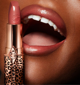 Charlotte Tilbury Glowing Jen lifestyle shot enhancing complexion and adding radiant, wearable color