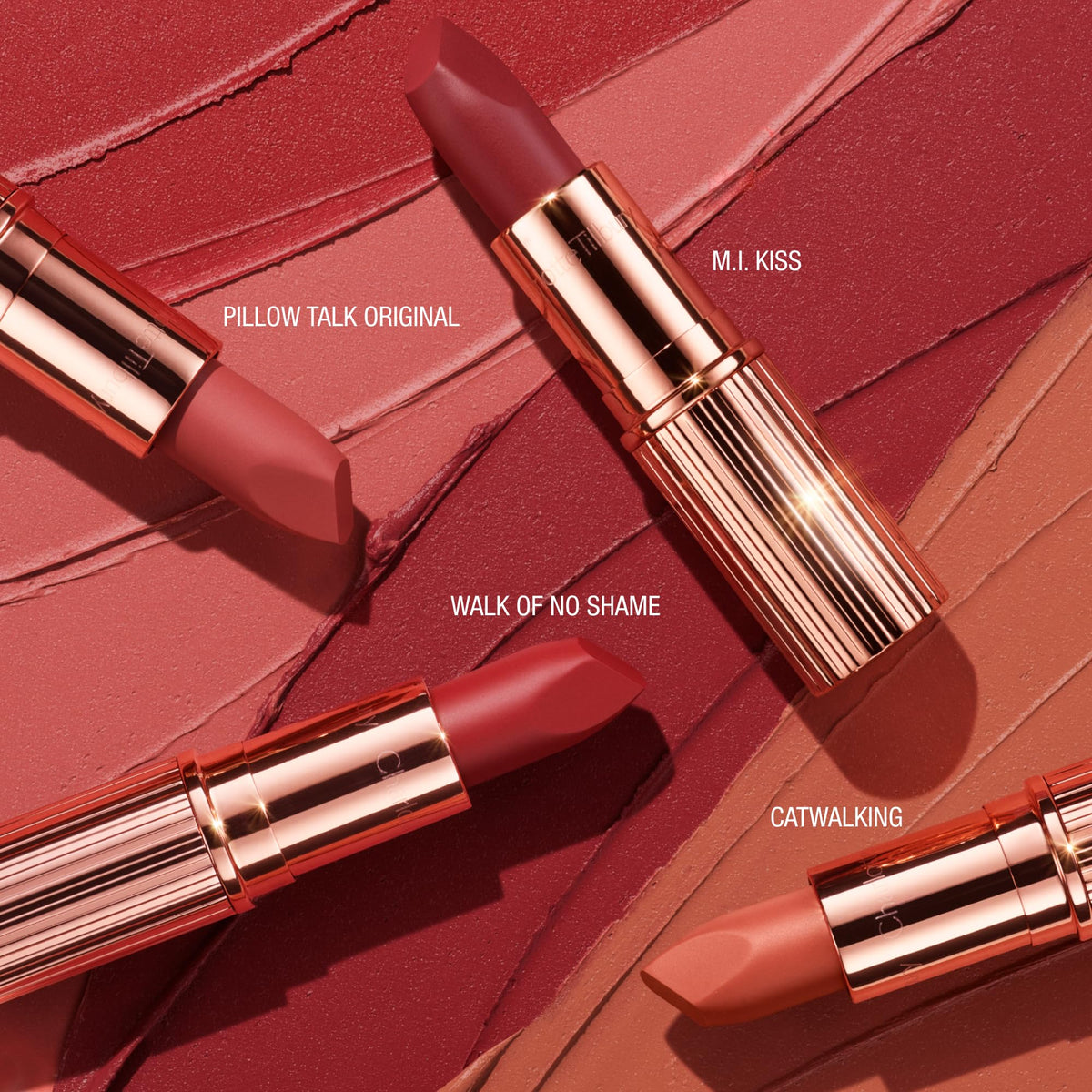 Charlotte Tilbury lip swatch on smile displays vibrant Hollywood Vixen color payoff