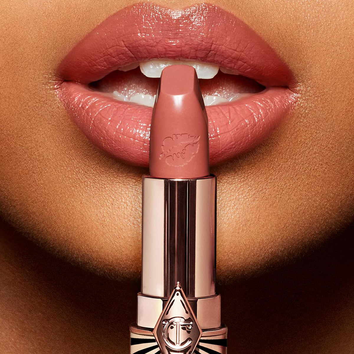Charlotte Tilbury close-up of lipstick bullet texture with smooth satin coverage