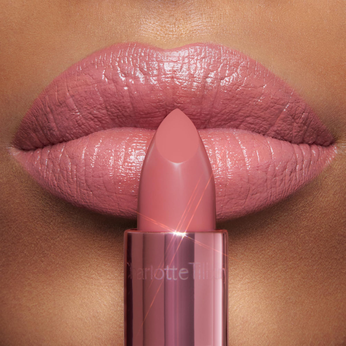 Charlotte Tilbury angled lipstick bullet revealing smooth, shimmery tip