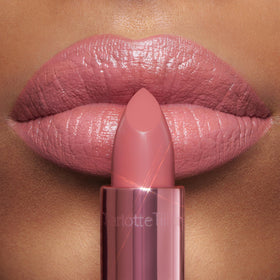 Charlotte Tilbury angled lipstick bullet revealing smooth, shimmery tip
