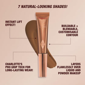 Charlotte Tilbury wand held in hand showing size and travel-friendly benefit