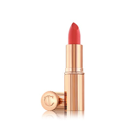 Charlotte Tilbury front packaging showing elegant tube and coral shade for polished presentation
