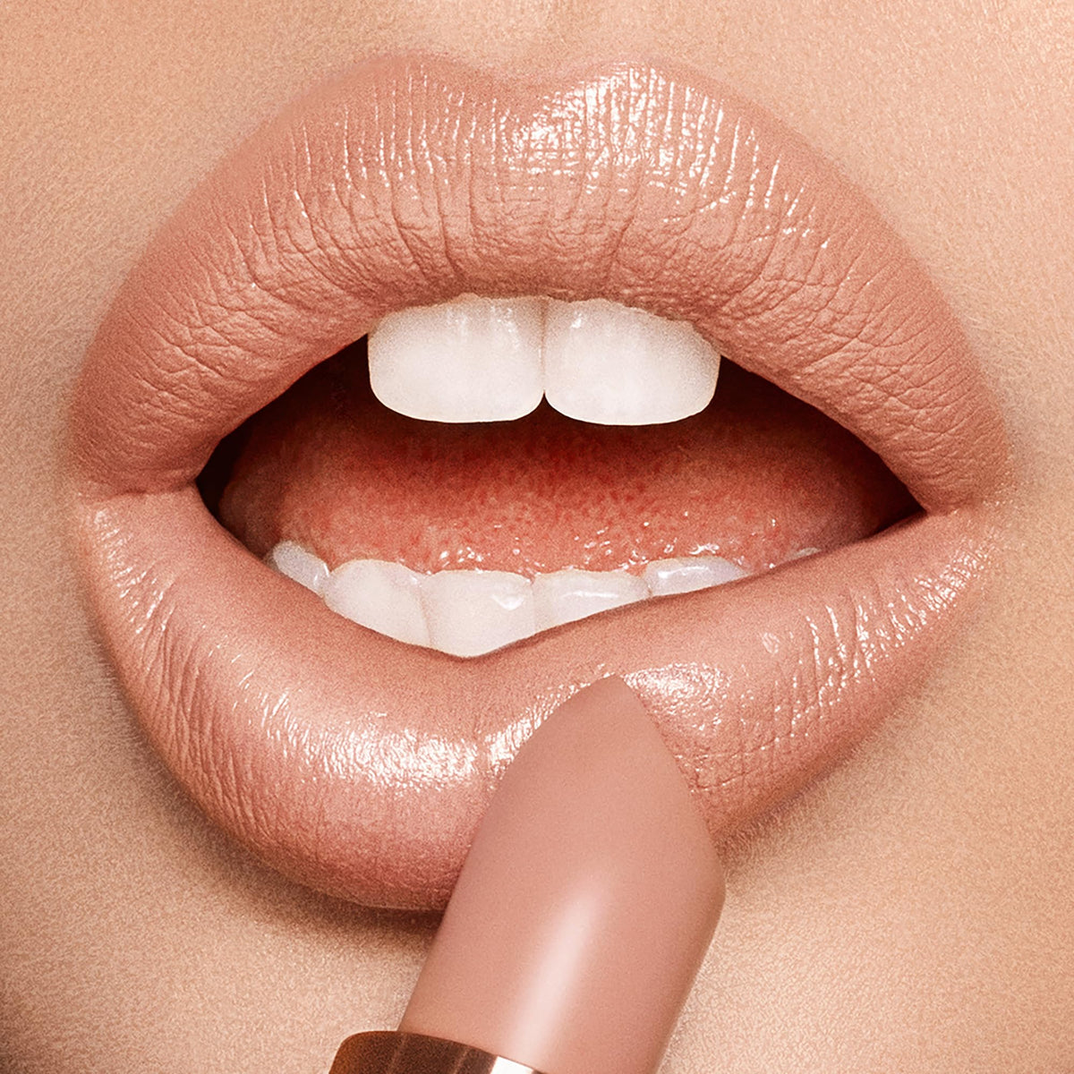 Charlotte Tilbury close-up of lipstick texture showing satin finish and moisturizing quality