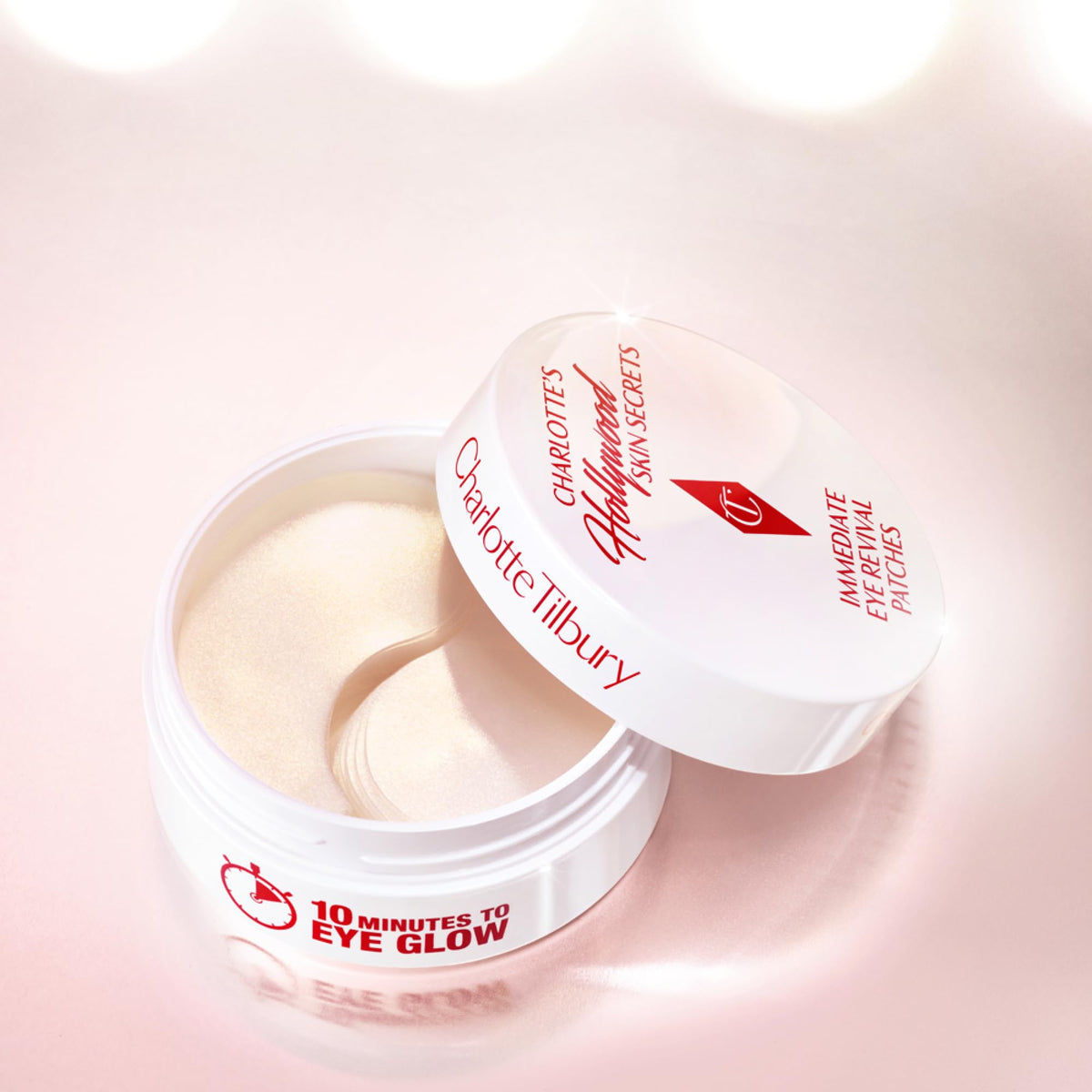 Charlotte Tilbury patches in a makeup setting, primes under eyes for flawless makeup