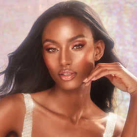 Charlotte Tilbury heart-shaped applicator close-up delivering precise, cushiony coverage for defined lips