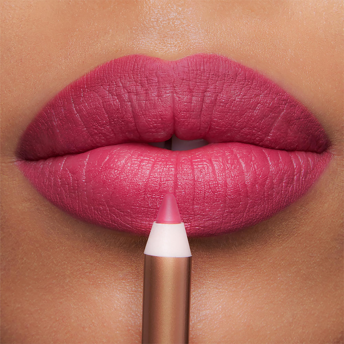 Charlotte Tilbury lip-on model showing shaped, fuller-looking pout for statement wear