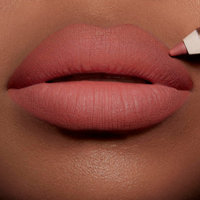 Charlotte Tilbury lip liner with cap off displaying tip and long-wear waterproof benefit