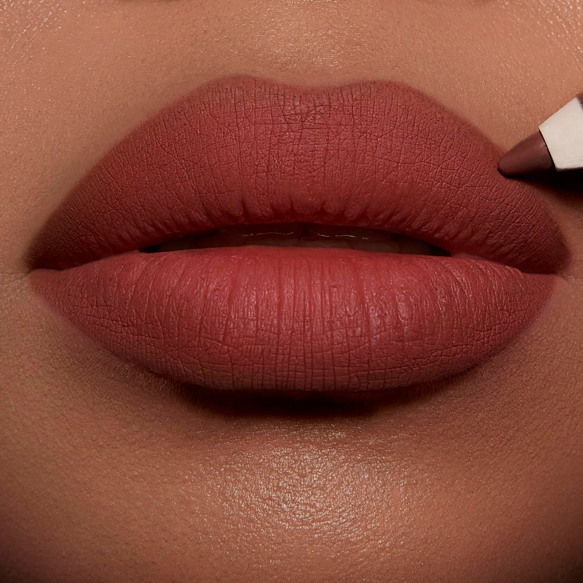 Charlotte Tilbury open cap and label visible to show shade name and product construction benefit