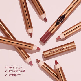 Charlotte Tilbury swatch on arm illustrating Savage Rose pigment and payoff