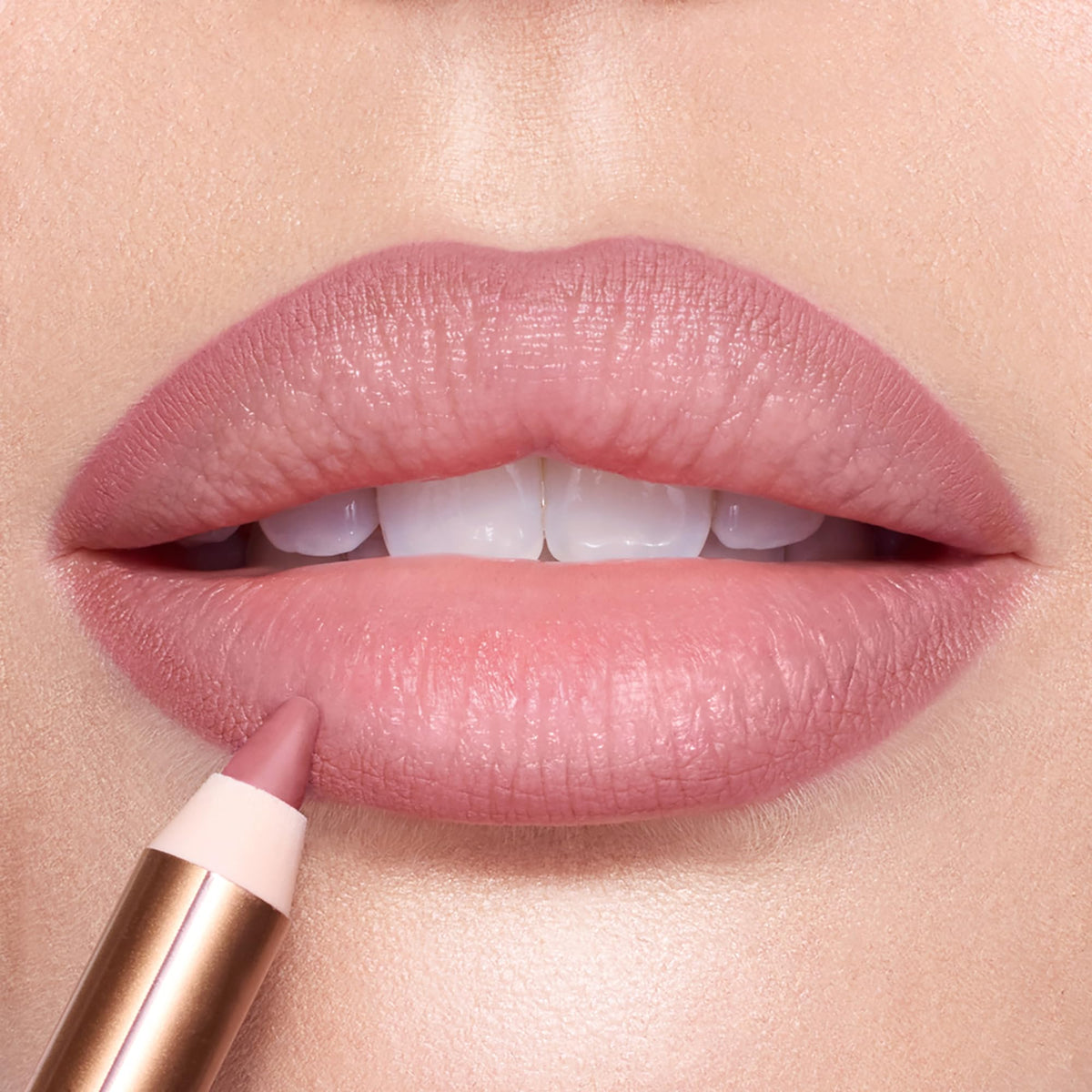 Charlotte Tilbury multiple swatches on arm revealing Pillow Talk Fair shade and buildable coverage