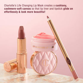 Charlotte Tilbury jar on bedside table, suggests overnight intensive hydration