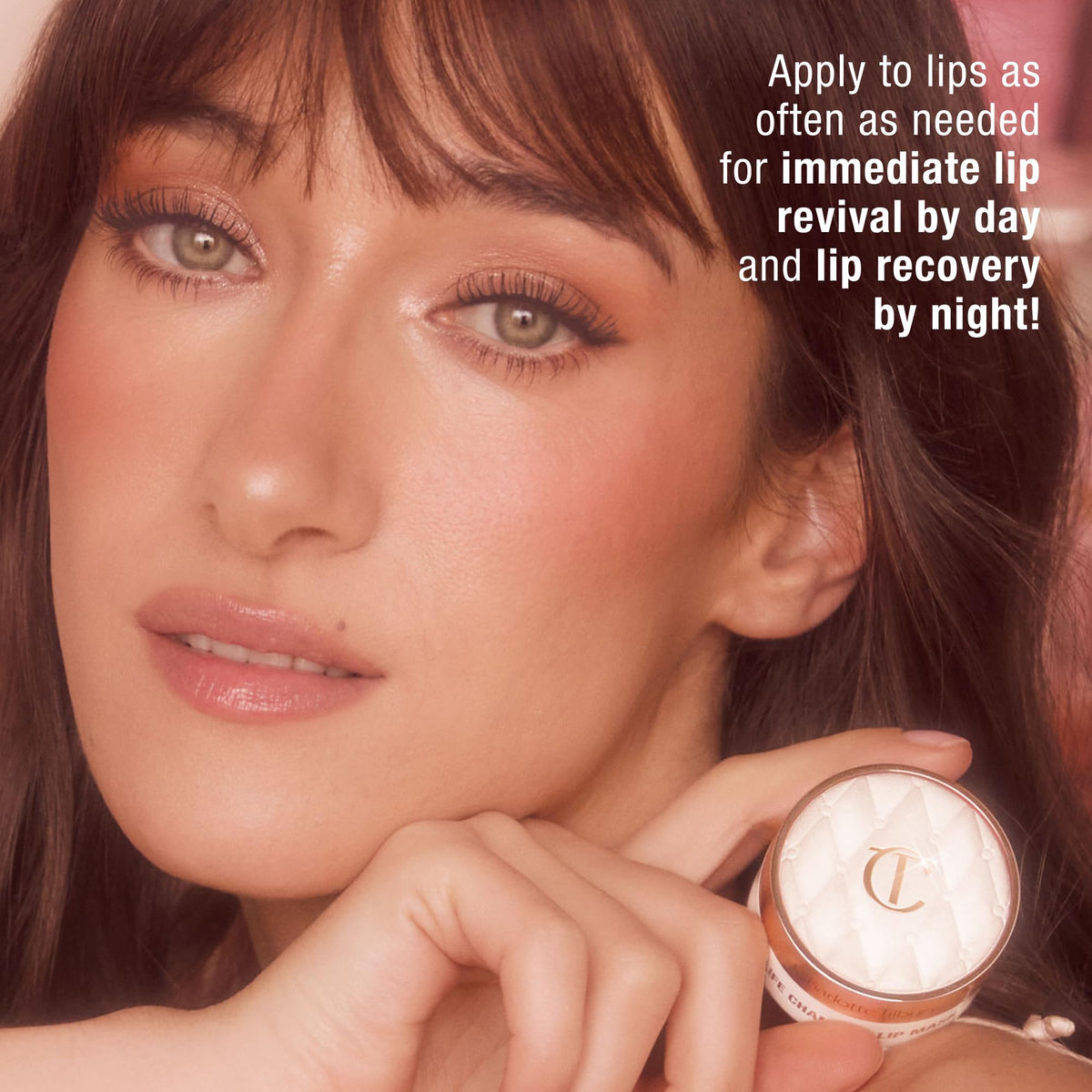 Charlotte Tilbury hand swatch of product, demonstrates sheer glossy coverage