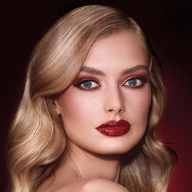 Charlotte Tilbury blush applied on model cheeks demonstrating sculpting and luminous glow