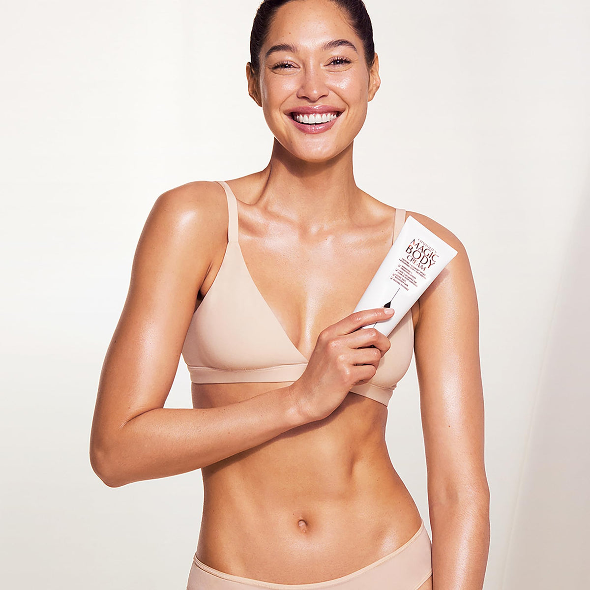 Charlotte Tilbury ingredients display featuring caffeine and algaktiv uplift benefits