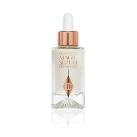 Charlotte Tilbury front bottle showing elegant label and luxe finish benefit: instantly recognizable premium presentation