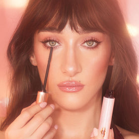 Charlotte Tilbury glossy mascara texture swipe demonstrating smooth, non-clumping finish