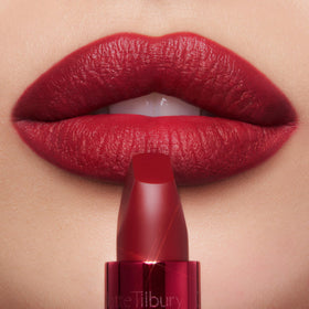 Charlotte Tilbury lipstick applying to lips demonstrating smooth glide and accurate line
