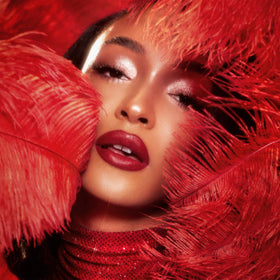 Charlotte Tilbury open tube with lid detail highlighting luxurious finish and easy grip