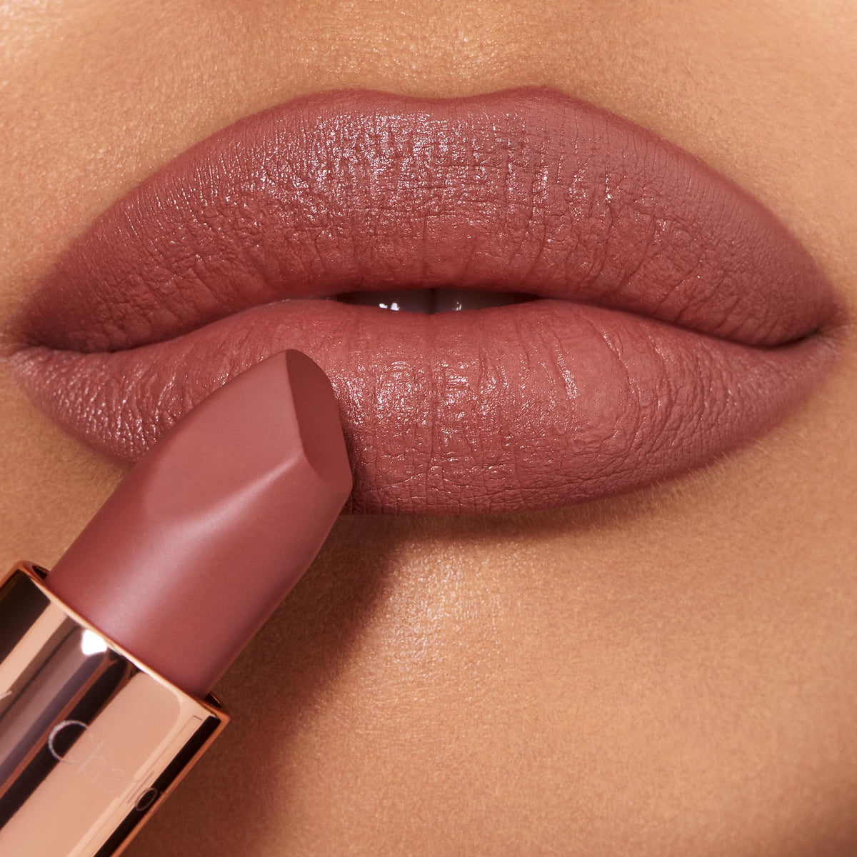 Charlotte Tilbury lipstick applied on lips for soft-matte look and comfortable wear