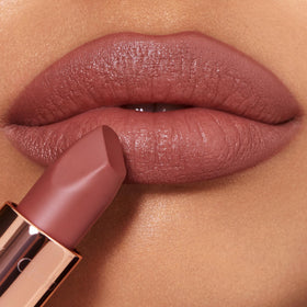 Charlotte Tilbury lipstick applied on lips for soft-matte look and comfortable wear
