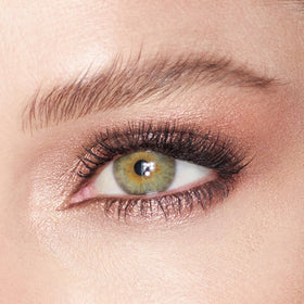 Charlotte Tilbury application with fingertip demonstrating quick swipe-and-go radiance
