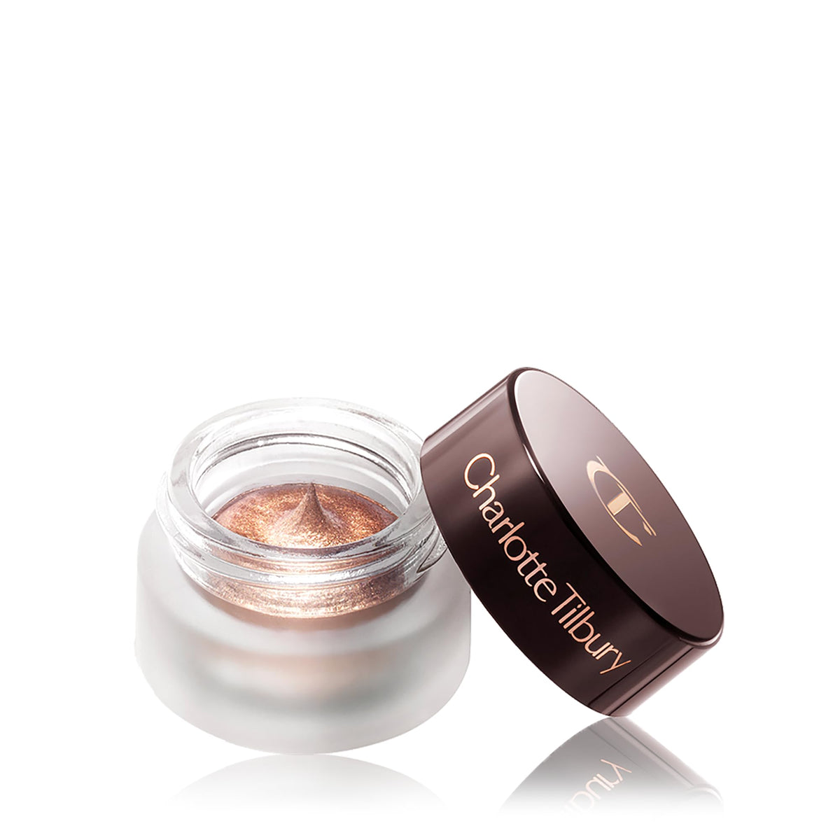 Charlotte Tilbury product on a vanity setting conveying travel-ready convenience and polished look