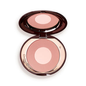 Charlotte Tilbury compact front view showing two-tone blush and elegant packaging benefit: instant visual appeal