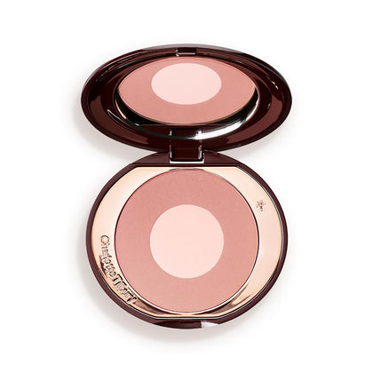 Charlotte Tilbury compact front view showing two-tone blush and elegant packaging benefit: instant visual appeal