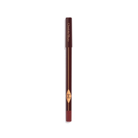 Charlotte Tilbury applied along upper lash line creating defined yet soft look